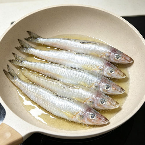 Silver sillago fish arranged in a serving bowl